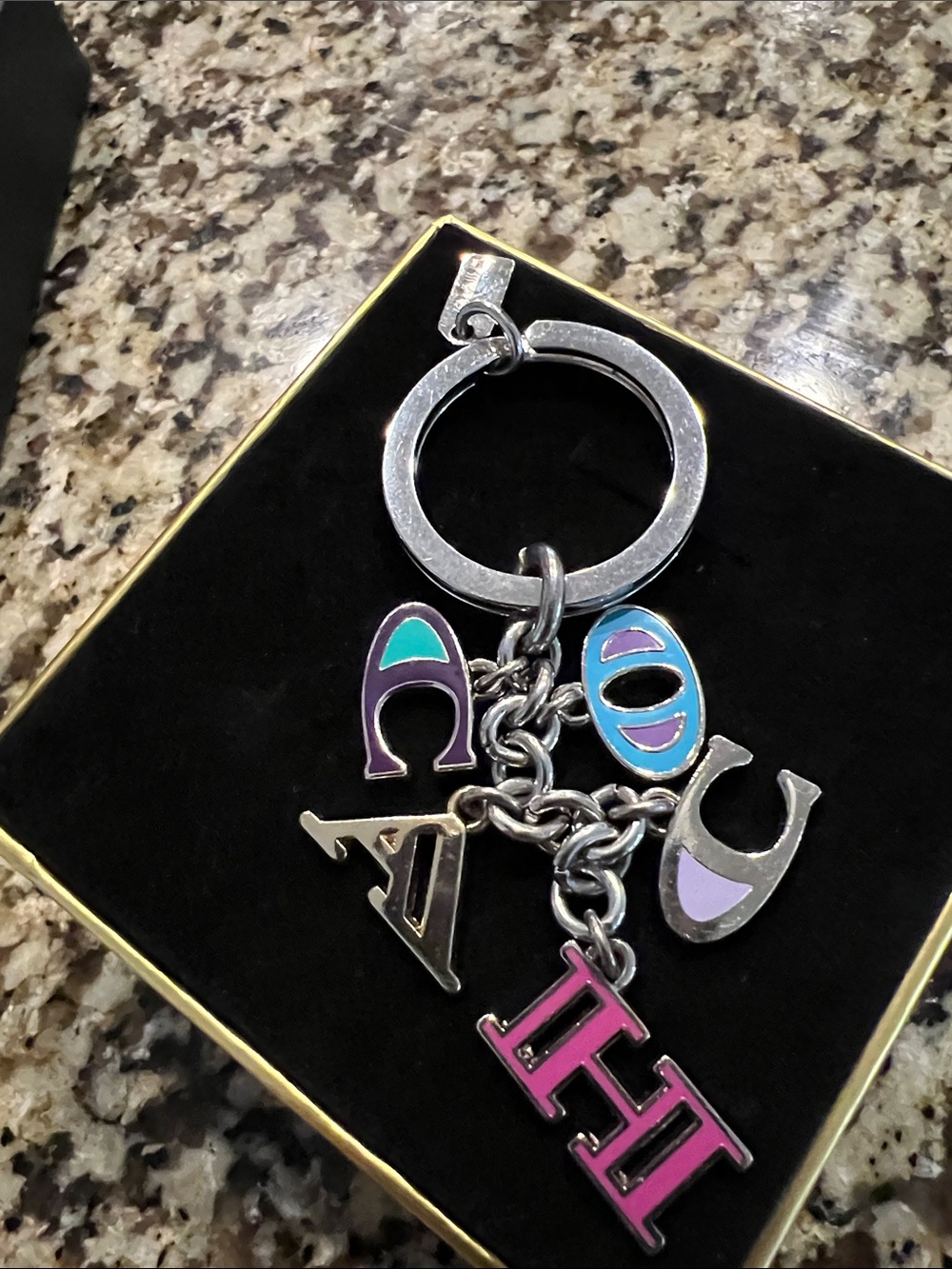 Coach Bag or key Chain Tag with the Coach letters spelled out on charm